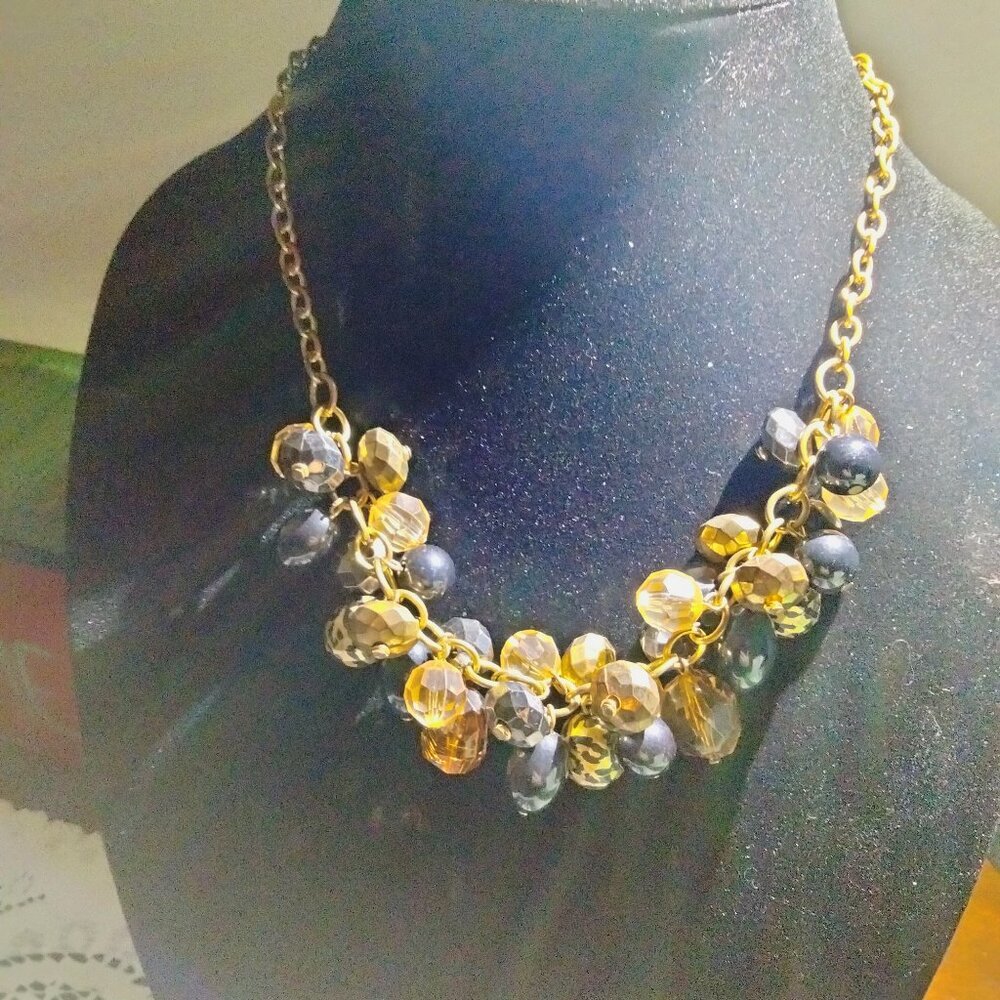 Necklace with black and gold beads